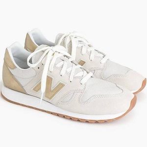New Balance Gold and White Sneakers